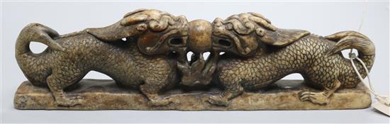 A Chinese stone confronting dragon scroll weight